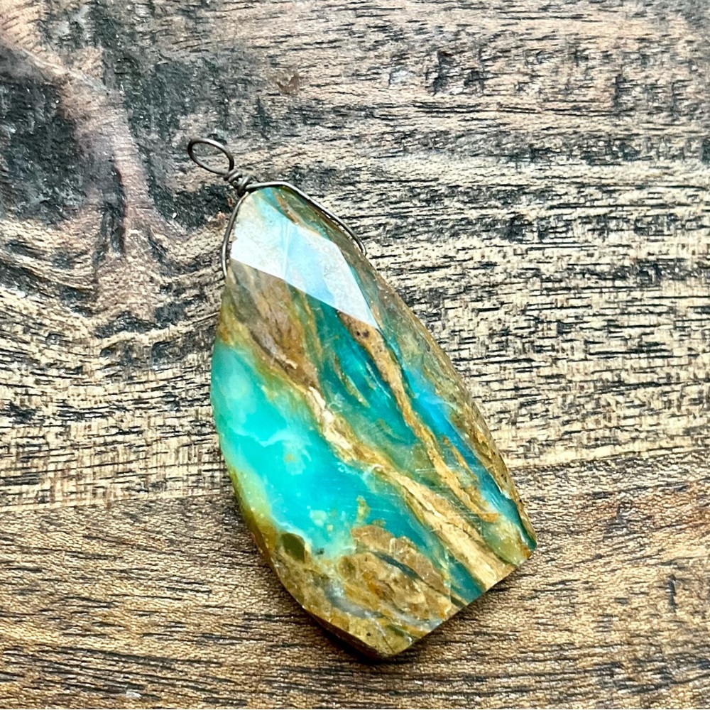 Stone pendants (2): Made in Los Angeles, CA.